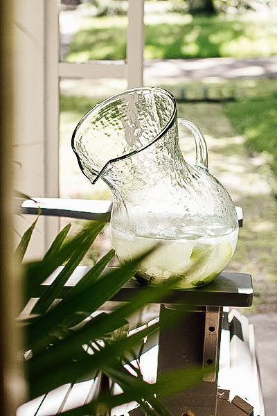 Tilted glass pitcher
