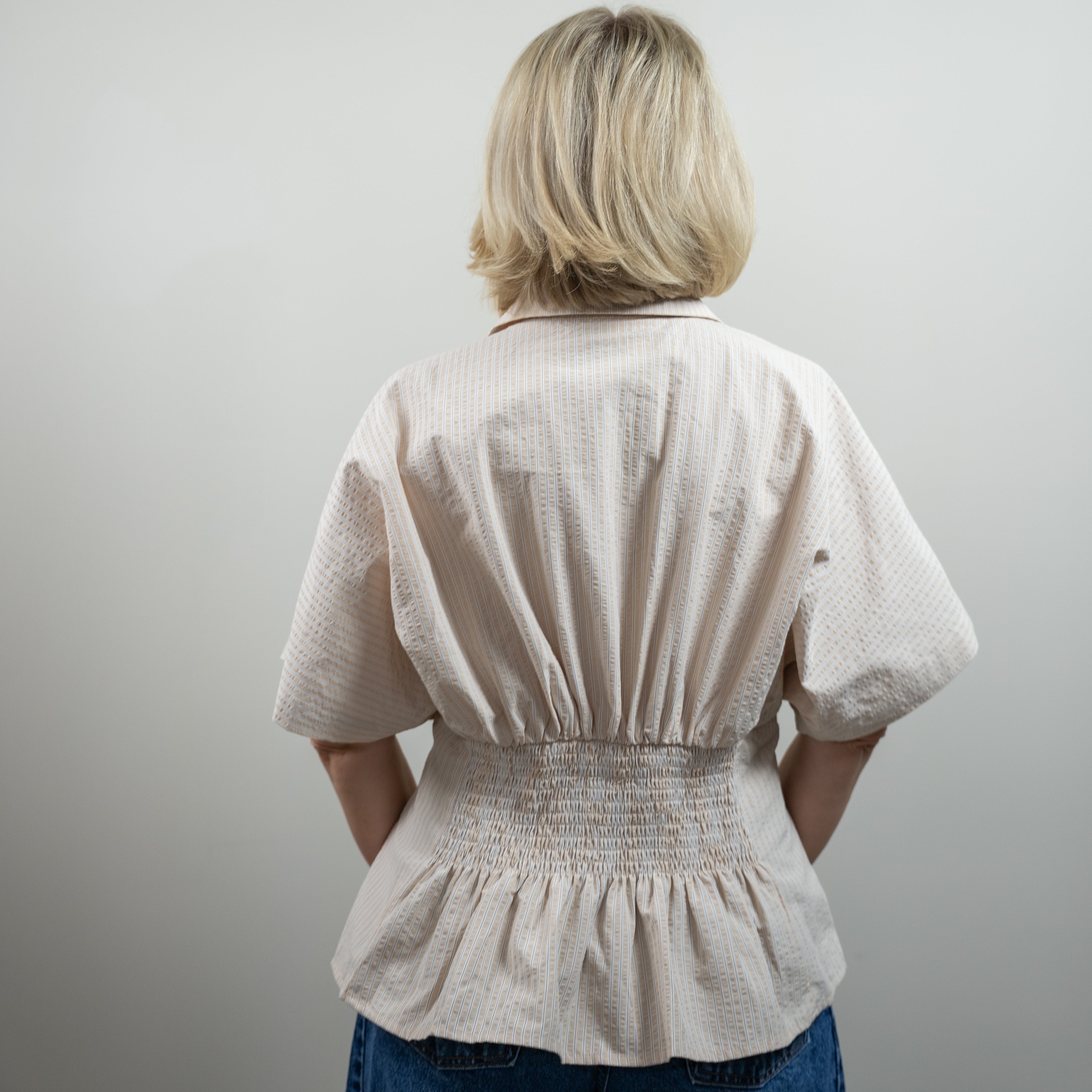 Button-Up Pleated Peplum Top